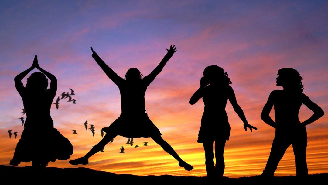 silhouette of women with sunset